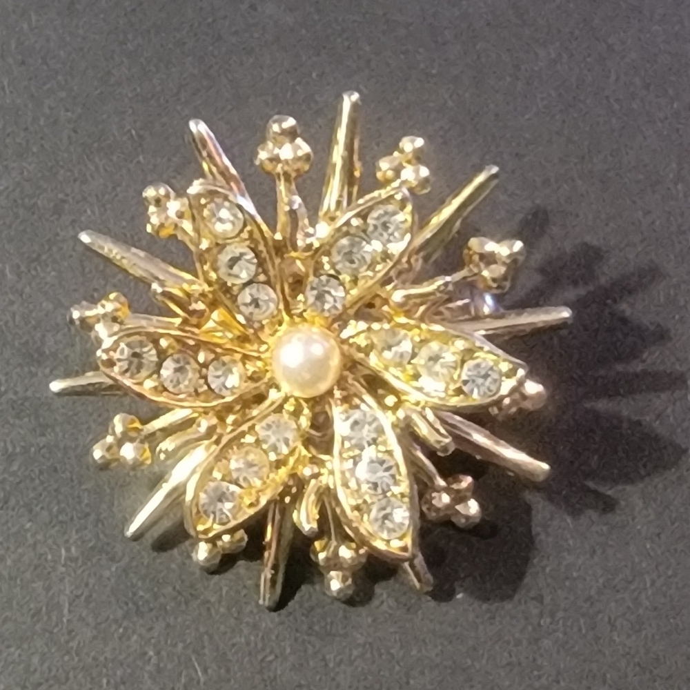 Elegant Gold and Silver Floral Brooch